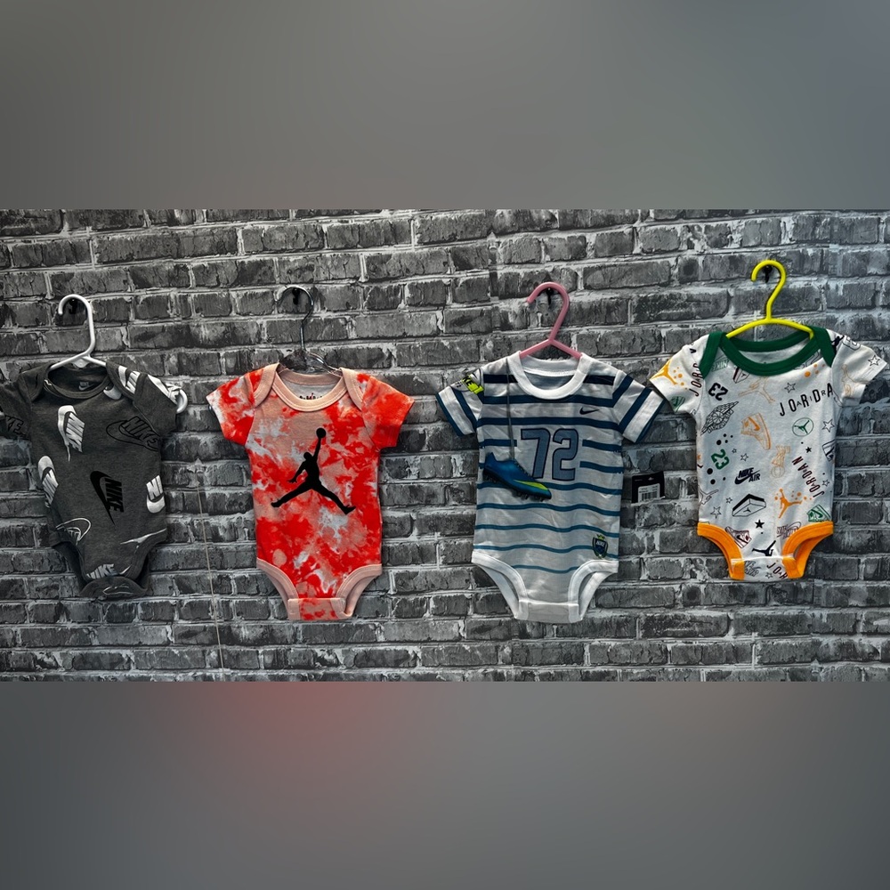 Nike onesies‎